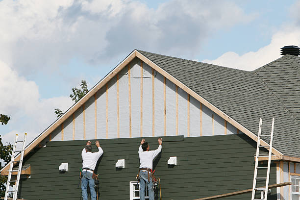 Professional Siding technician working in Kingston, NY